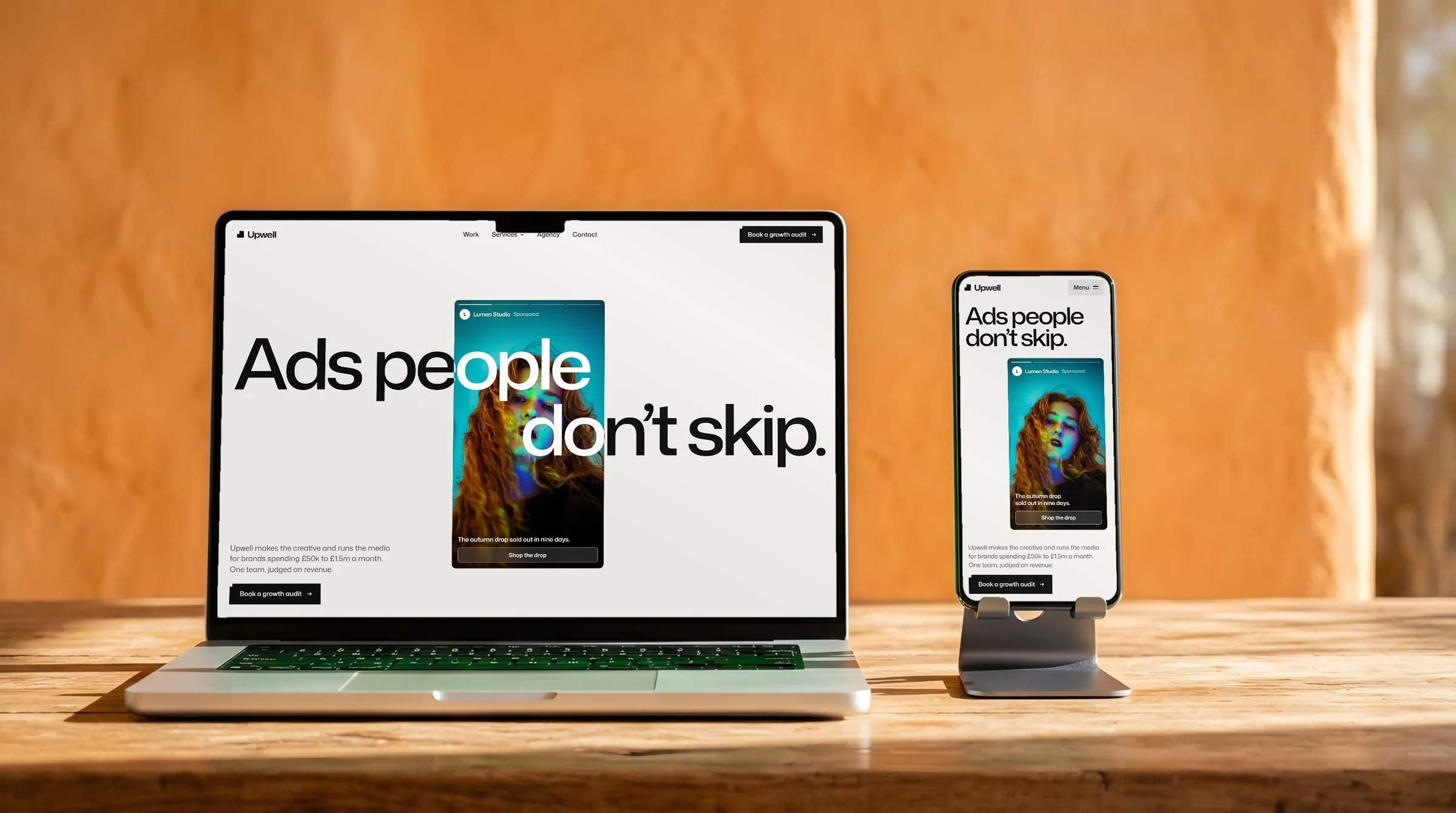 The Upwell website on a laptop and a phone